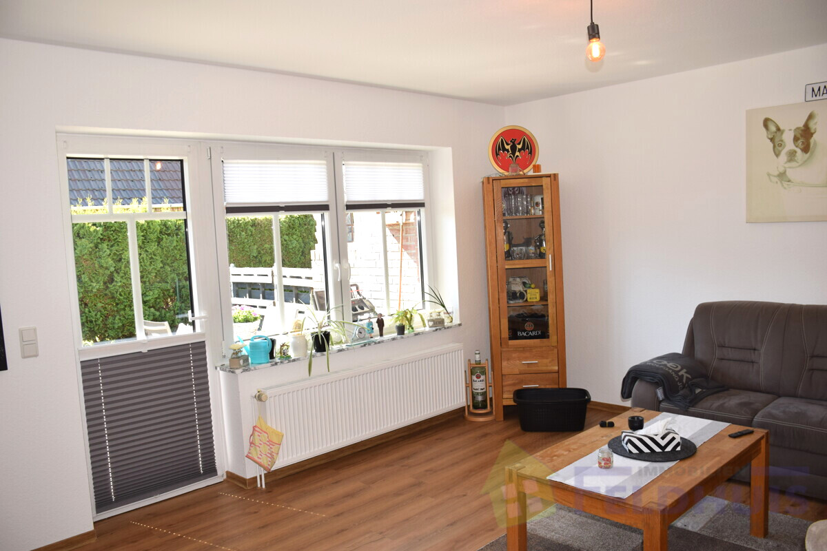 Wohnzimmer EG Wohnung links Bild 2